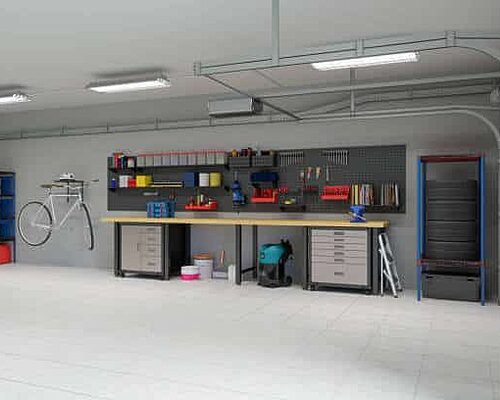 Empty Garage With Working Equipments, Tools And Bicycle Hanging On The Wall.